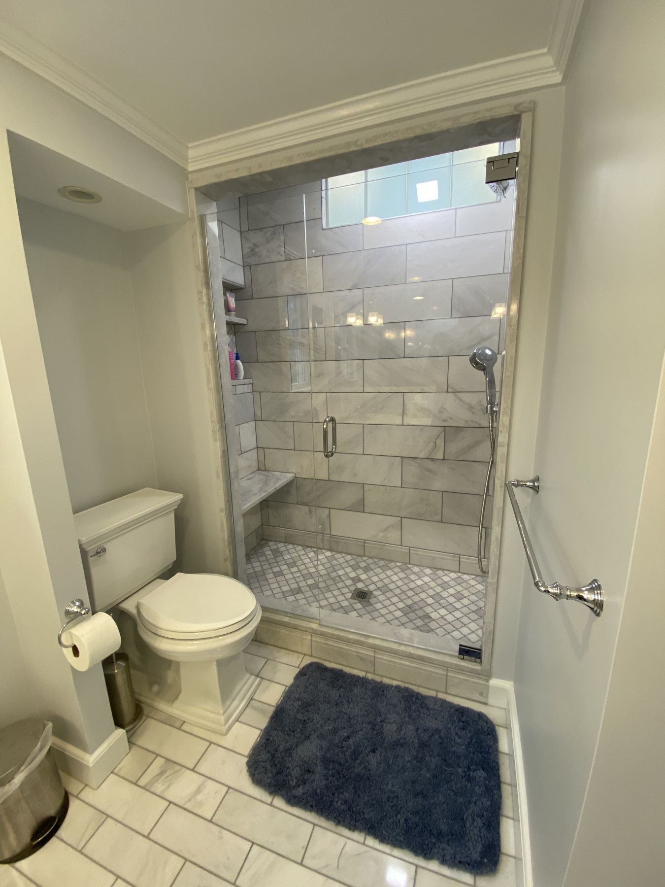 Marble bathroom with a tiled walk-in shower